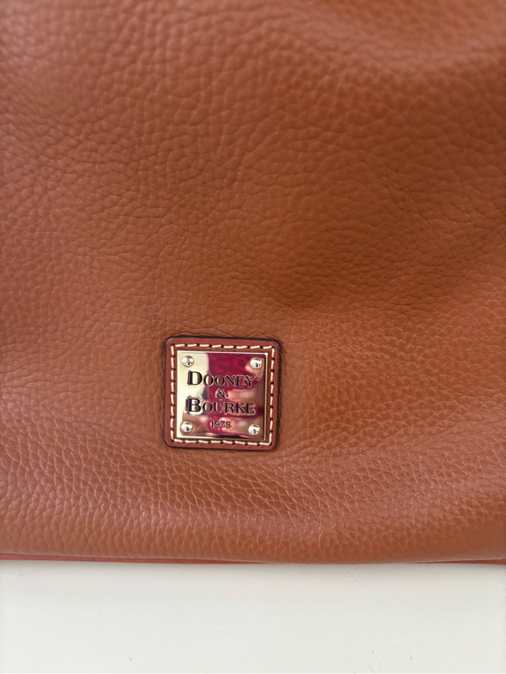 Dooney & Bourke Pebbled Leather Tote in Cognac Brown with Gold Plaque